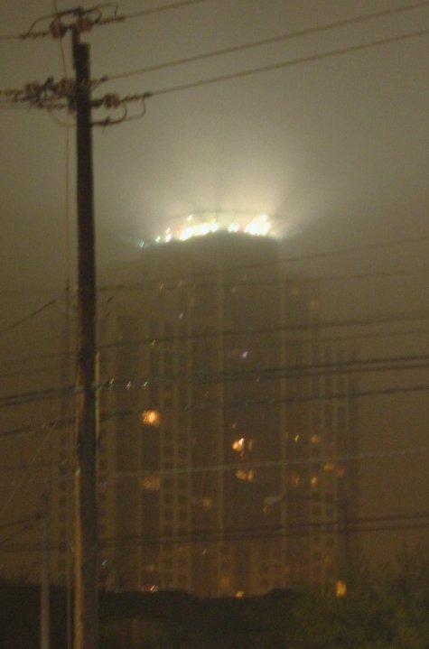 A building in the fog